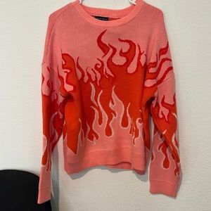 Brand new Aqua Blues pink flames sweater